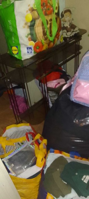 lote de rouipas usadas para senhor,.~senhiora e crianlça,.