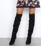Botas acima do joelho