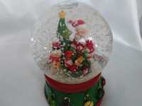 Сувенир снежный шар "Дед Мороз на подставке", музыкальный .