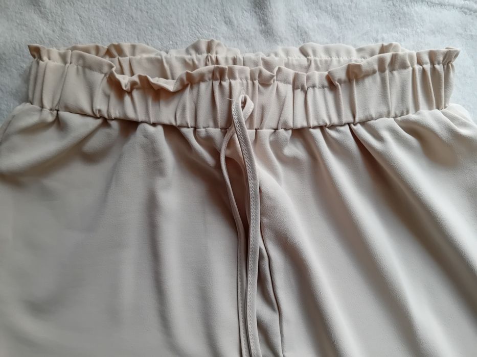 Spodnie szerokie beż