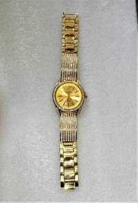 Damski elegancki zegarek z cyrkoniami w kolorze złota