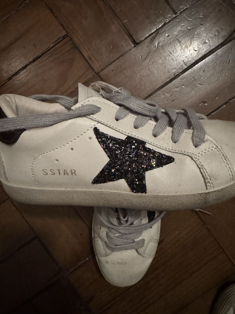 Sapatilhas Star em bom estado