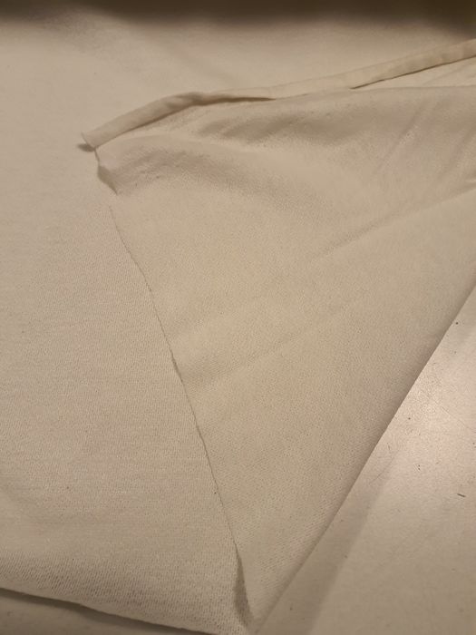 Tkanina ecru cieńsza szer.150 cm.