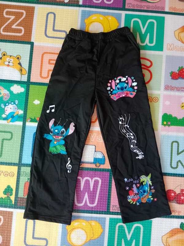 Nowe spodnie dziewczęce dresowe Stich 7-8Y