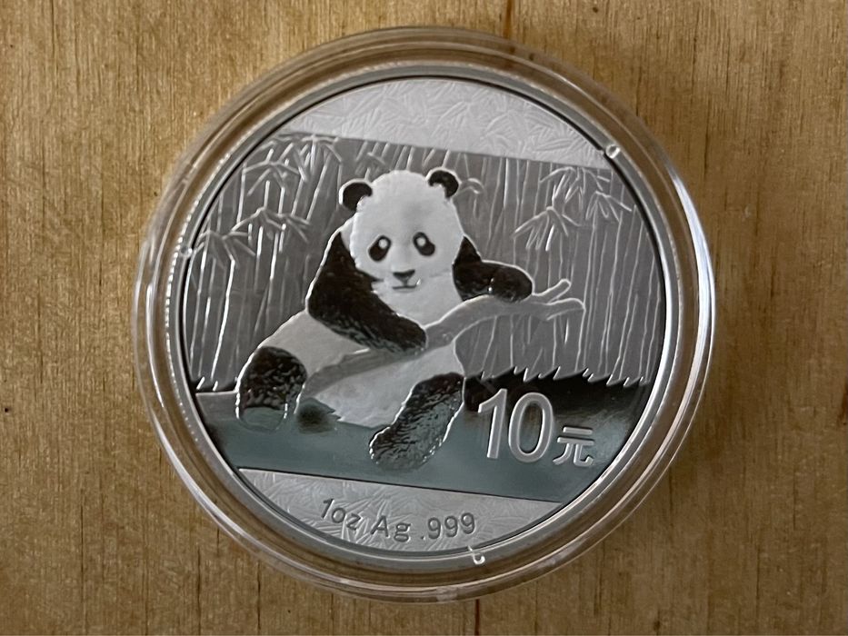 Инвестиционная серебряная монета Китая панда 2014 год