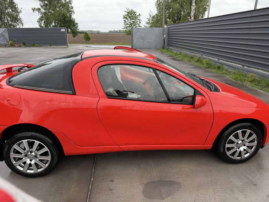 Opel Tigra 1.4 , 1995 року