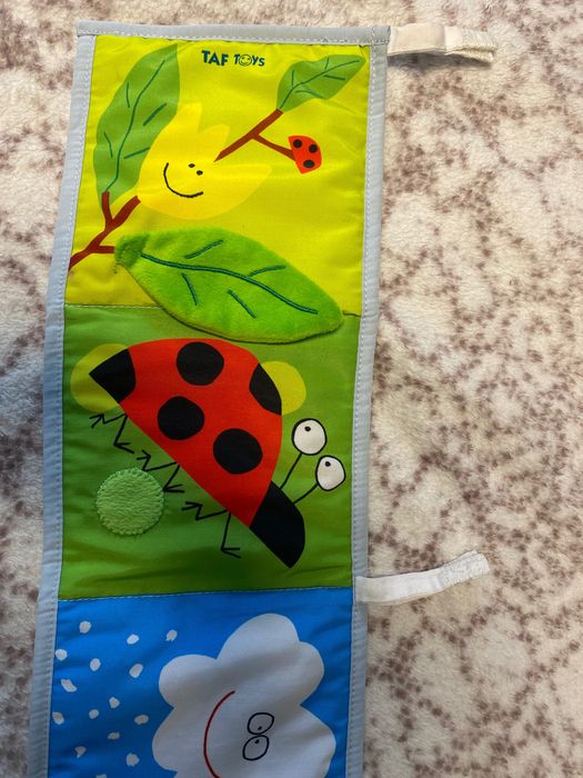 В кроватку розвиваивающа книжка