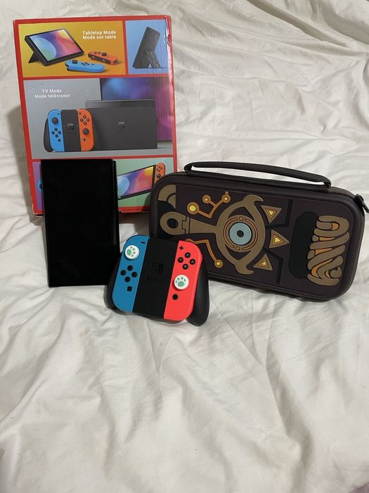 Nintendo switch oled blue/red разом  з трьома іграми  та чохлом