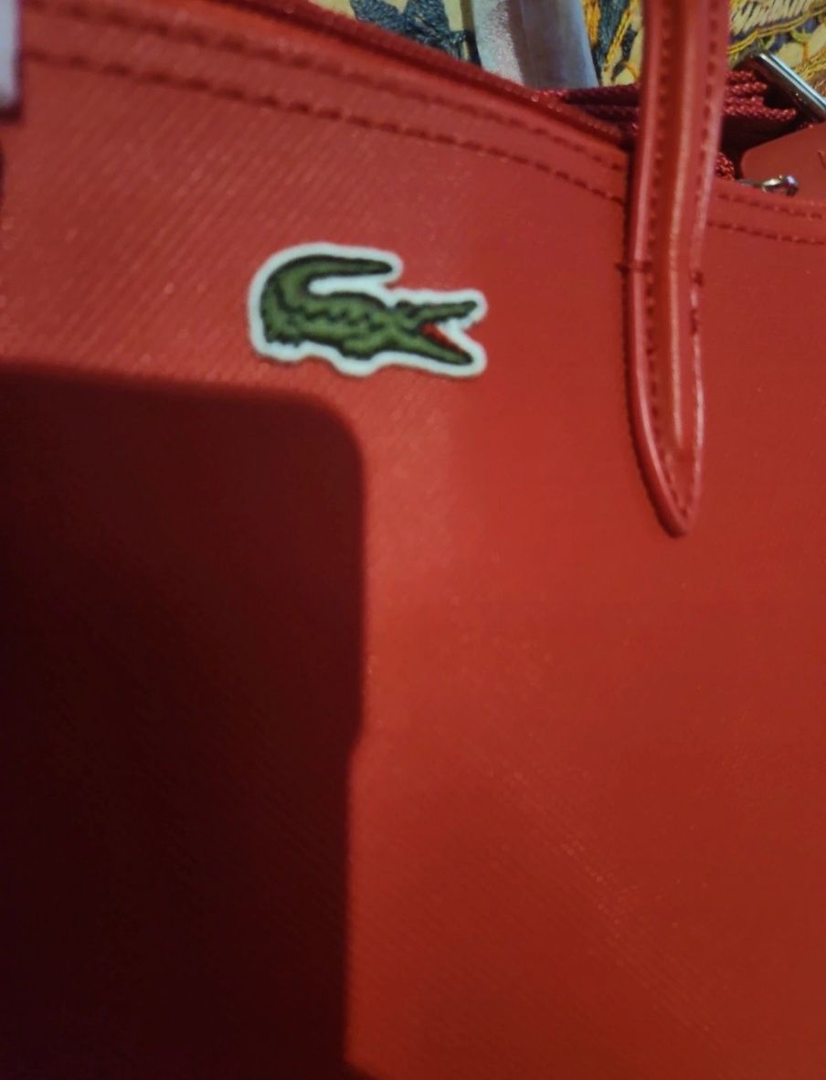 Bolsa nova lacoste com saco