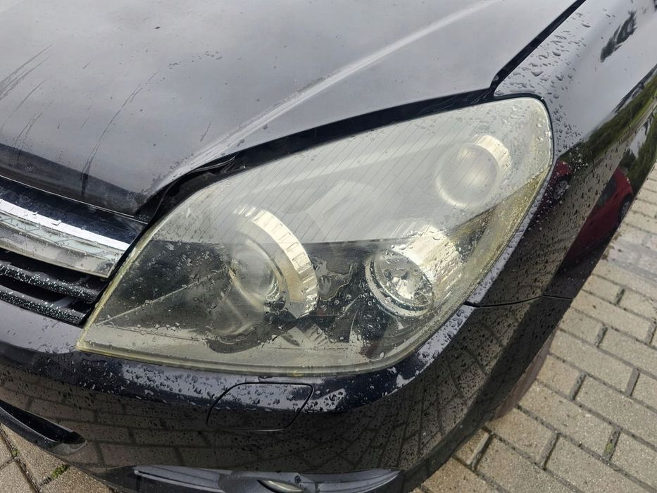Reflektor lampa lewa przód Xenon Opel Astra H