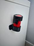 Uchwyt nocowanie na baterii milwaukee m12