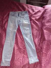 Spodnie jeansowe Sinsay 38