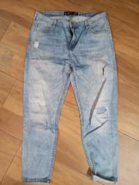 Jeansy spodnie damskie jeansowe jeans dziury r. 42 niebieskie przecier