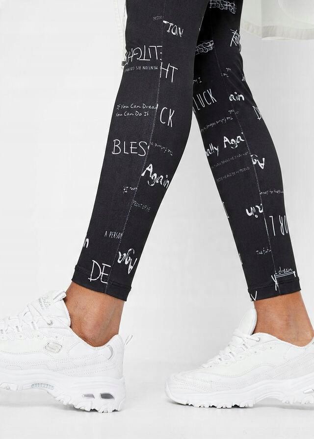 B.P.C legginsy czarne z białymi napisami r.32/34