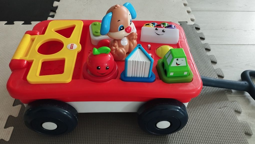 Zabawka fisher price wózek szczeniaczka