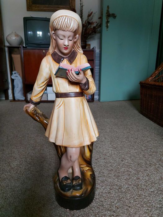Boneco em loiça.