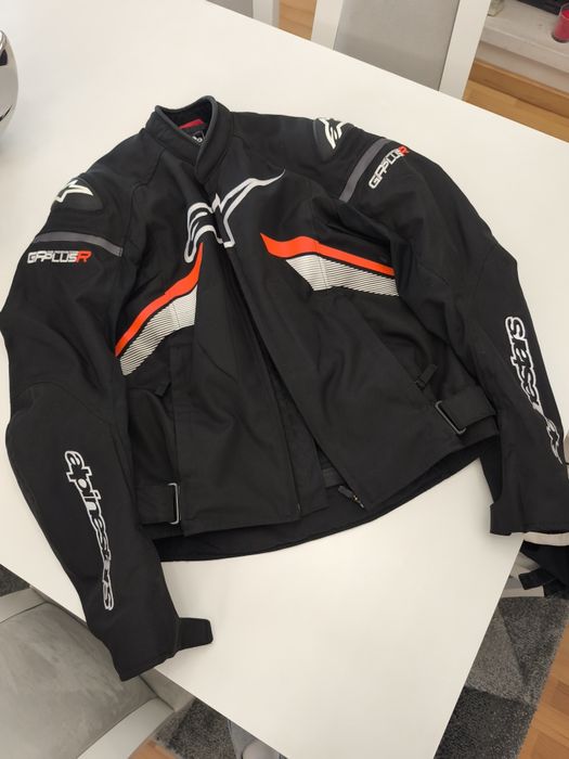 capacete, casaco e luvas mota