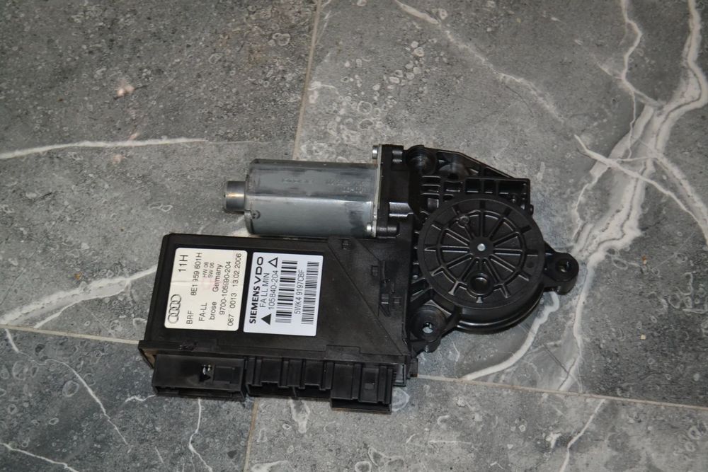 AUDI A4 B6 B7 SILNICZEK SZYB LEWY PRZÓD PRZEDNI 8E1959801H