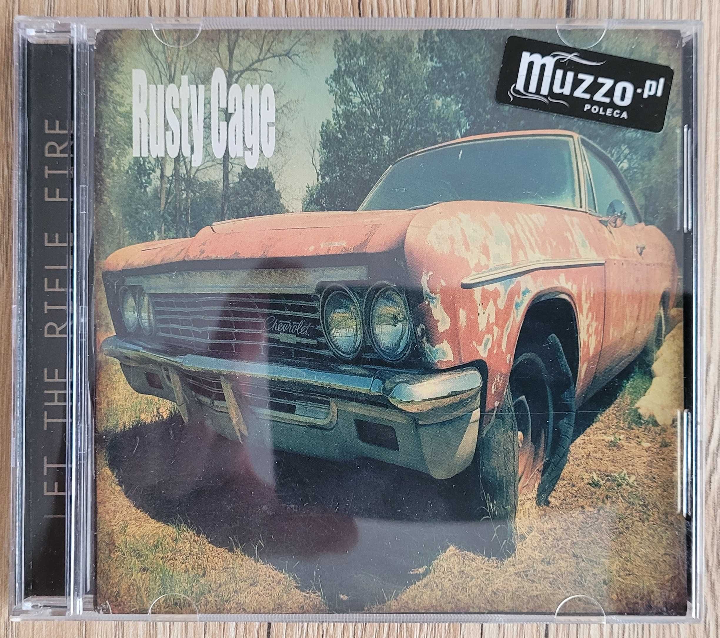 Rusty Cage - let the rifle fire - CD z autografami