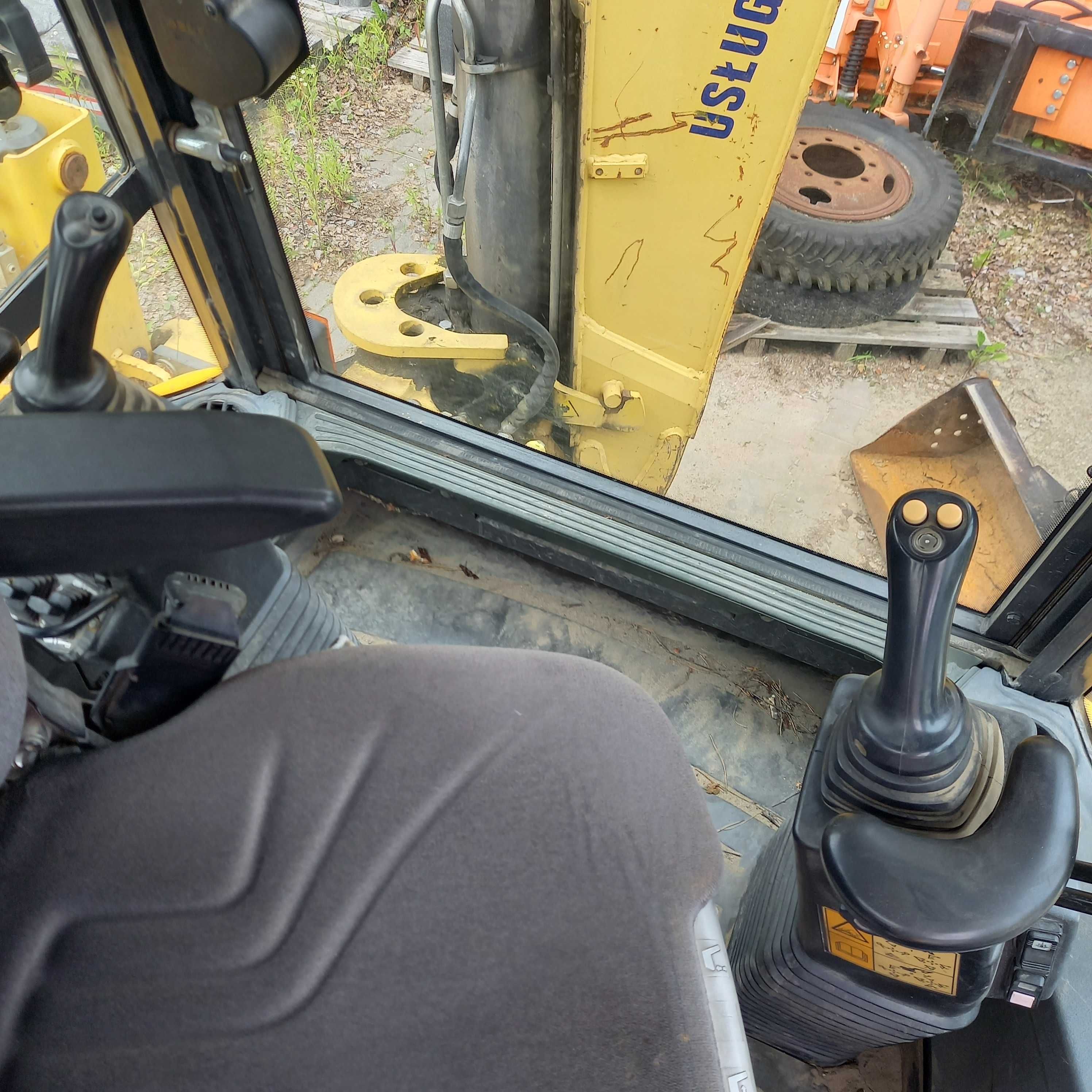 Sprzedam KOPARKO ŁADOWARKĘ NEW HOLLAND B110 C. w dobrym stanie