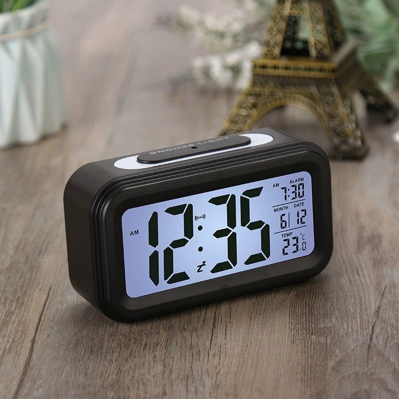 Електронний годинник з термометром, будильником.