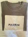 Camisola cinzenta e branca da Pull&Bear