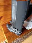 Botas pretas de mulher