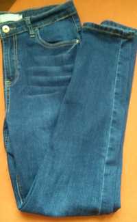Damskie jeansowe spodnie Femestage w rozmiarze 38.