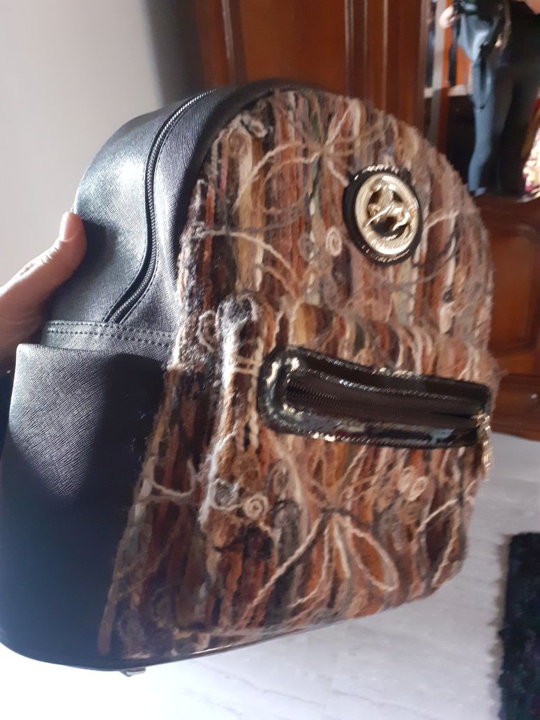 Vendo  ou troco mala cavalinho