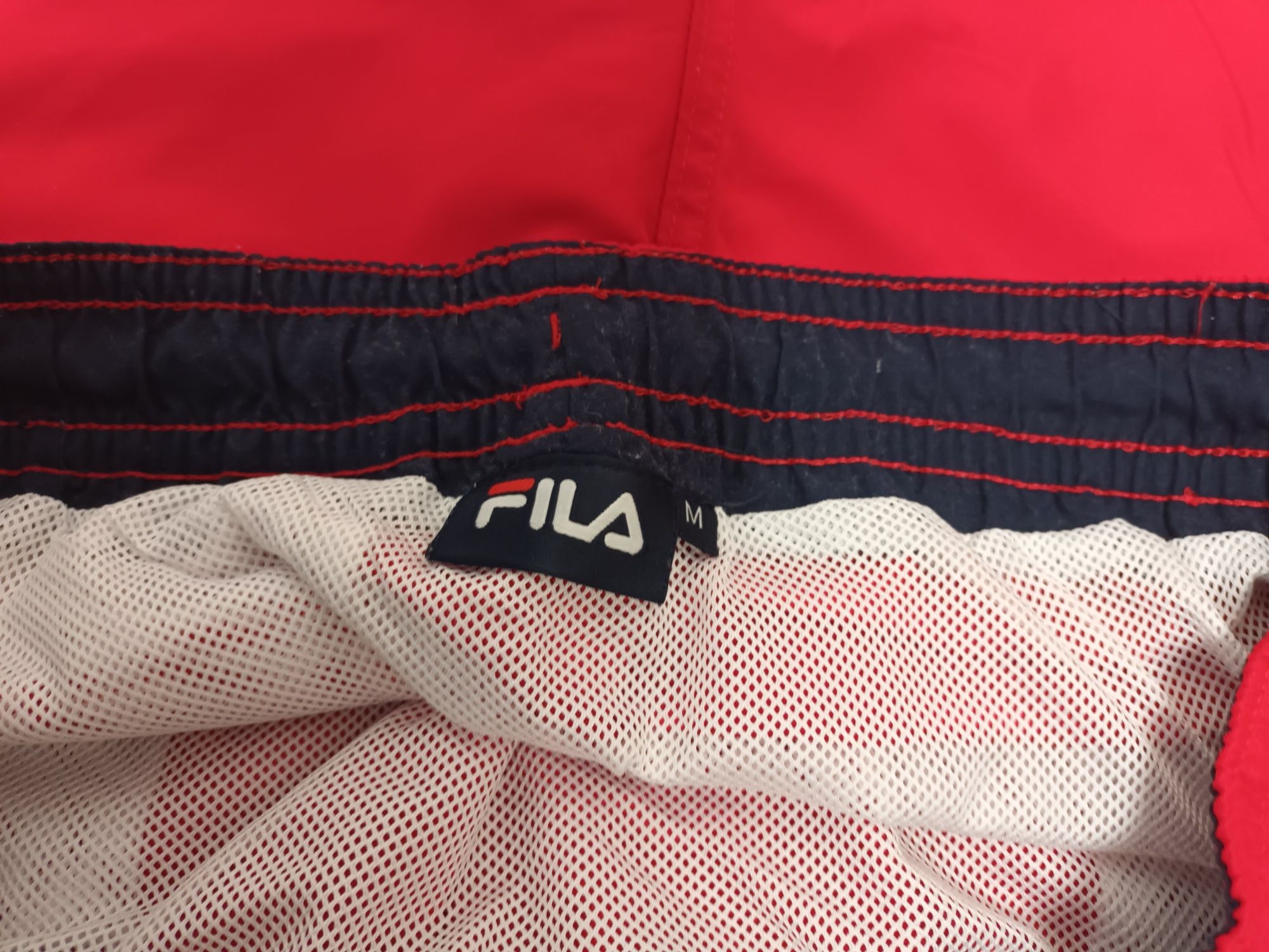 Calções vermelhos - Fila