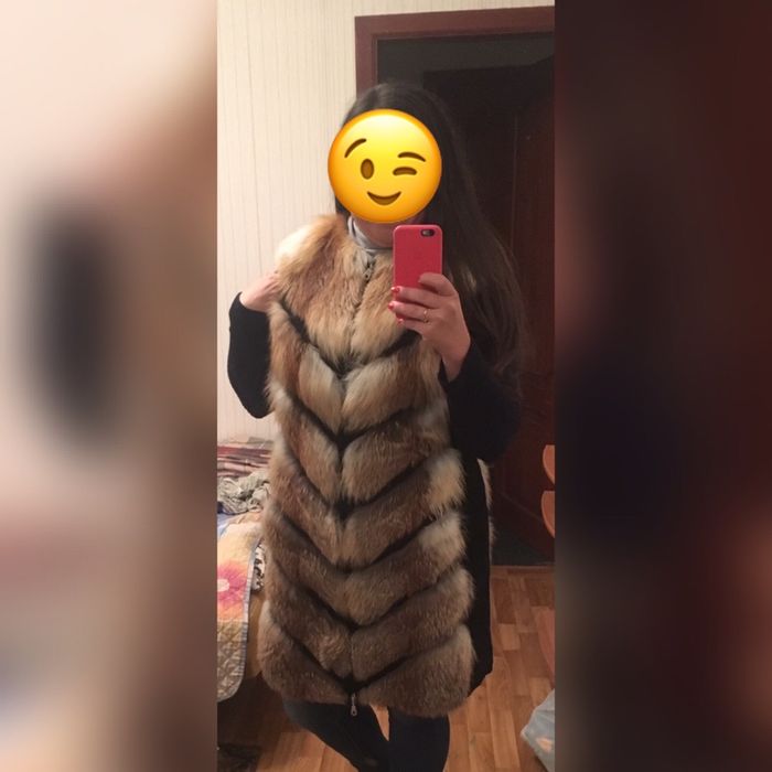 Меховая жилетка нова