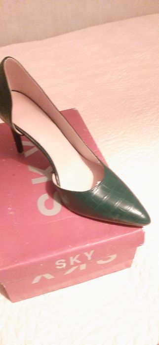 Sapatos verdes elegantes