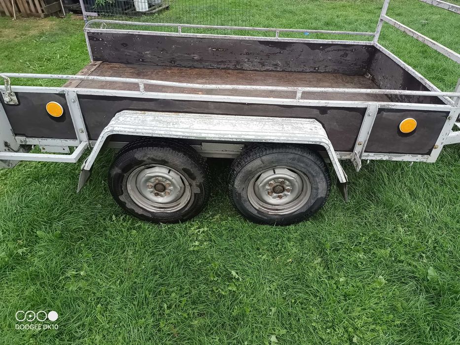 Przyczepka do minikoparki tandem dwuosiowa