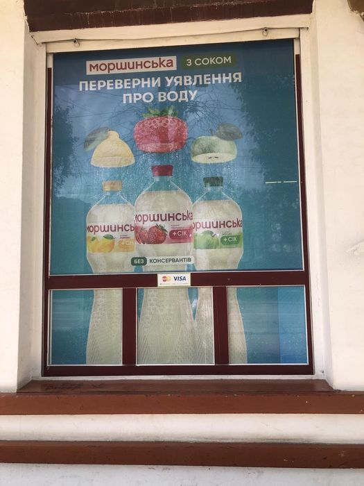 Переклейка,поклейка перфорированою плівкою вітрин, двері,,меблів .