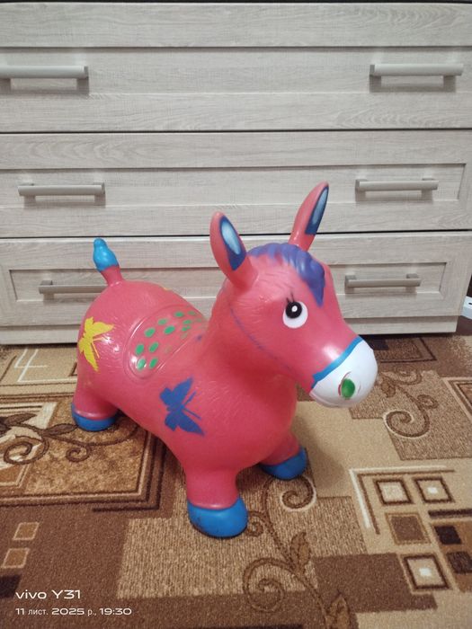 Надувний ризиновий ослик.