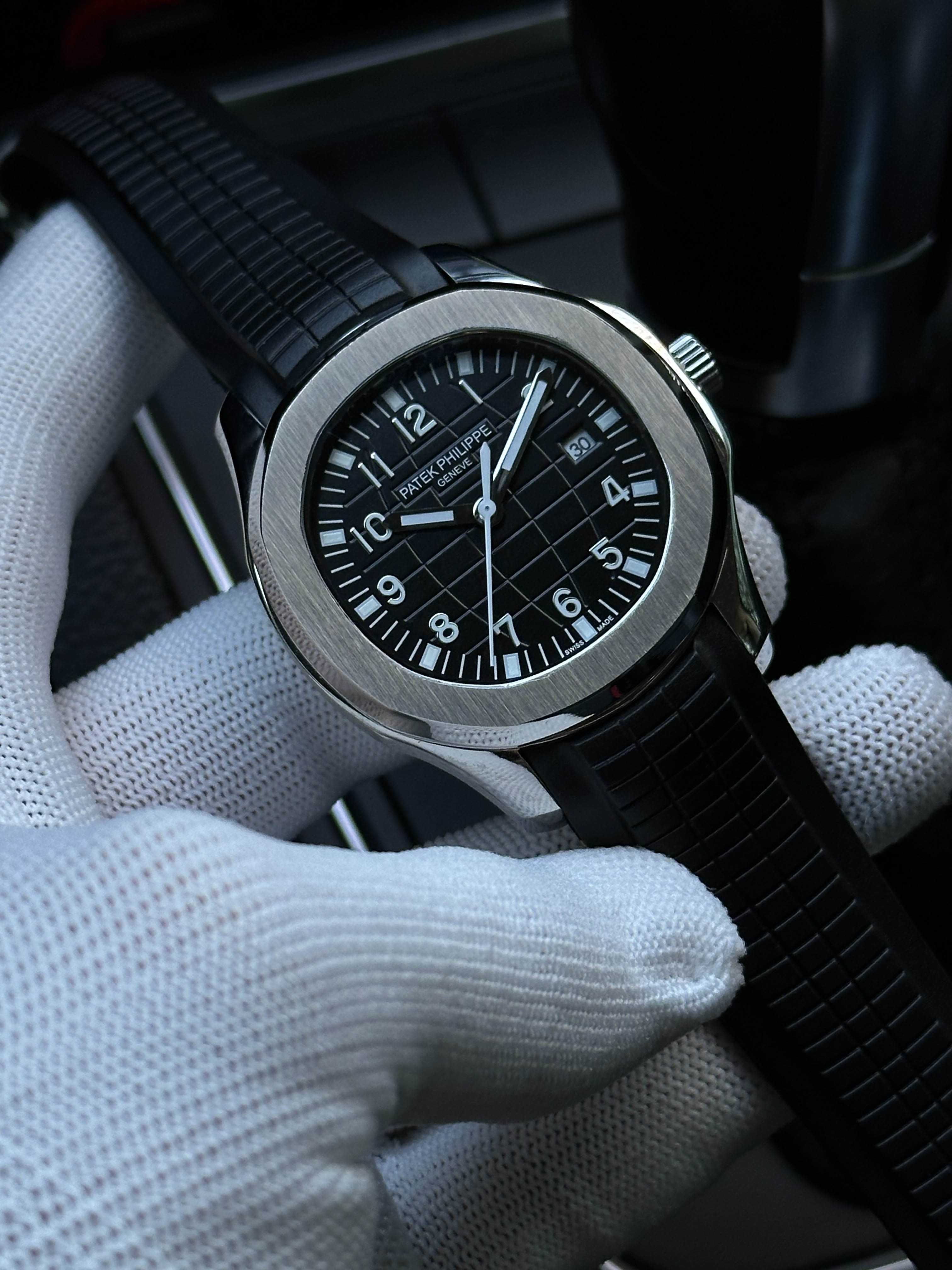 Швейцарские часы Patek Philippe Aquanaut. Механика с автоподзаводом.