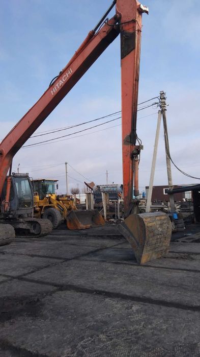 Услуги гусеничного экскаватора с глубиной копания до 15 метров