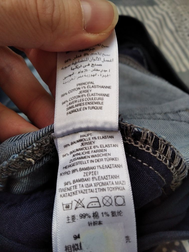 Elastyczne spodnie jeansy ciążowe z pasem Mothercare r.40