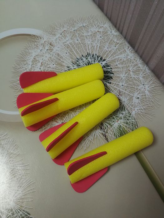 Іграшка помпова, яка стріляє м'якими патронами.