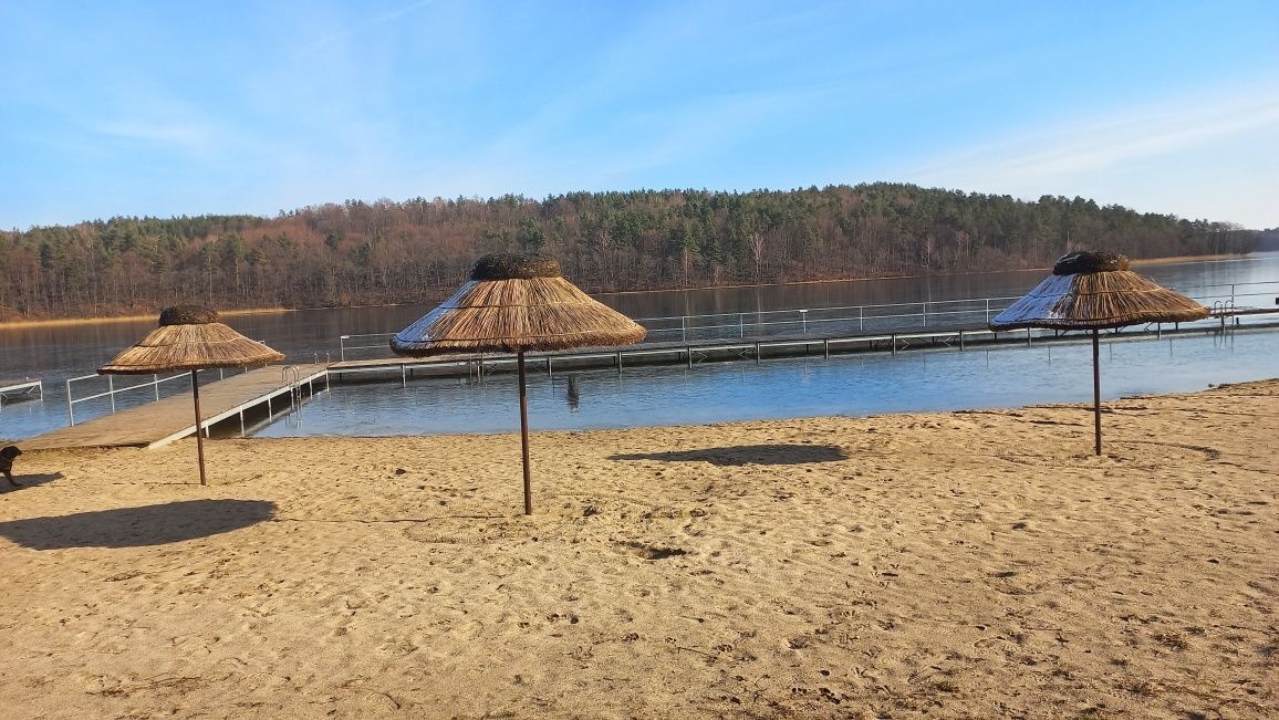 domek nad jeziorem basen sauna prywatne pomosty łódki kajaki