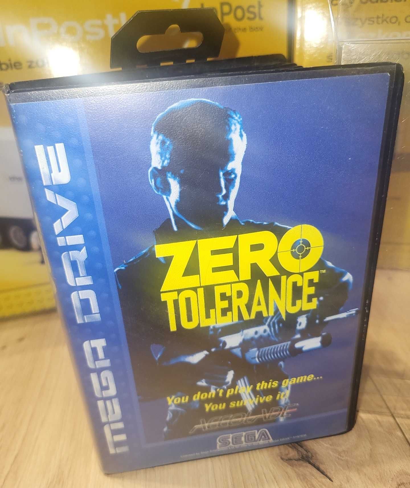Gra Zero Tolerance - SEGA Mega Drive - BDB- stan Komplet +Protektor