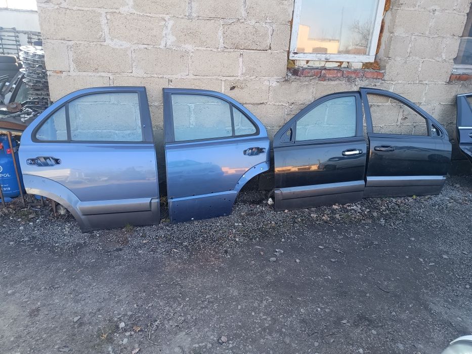 Drzwi przód tył prawe lewe Kia Sorento I