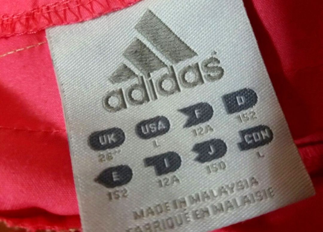 Calções marca Adidas para menina (12 anos)