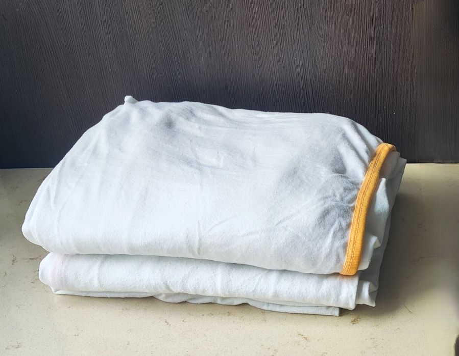 Dwa bawełniane ,białe prześcieradła 90 x 200