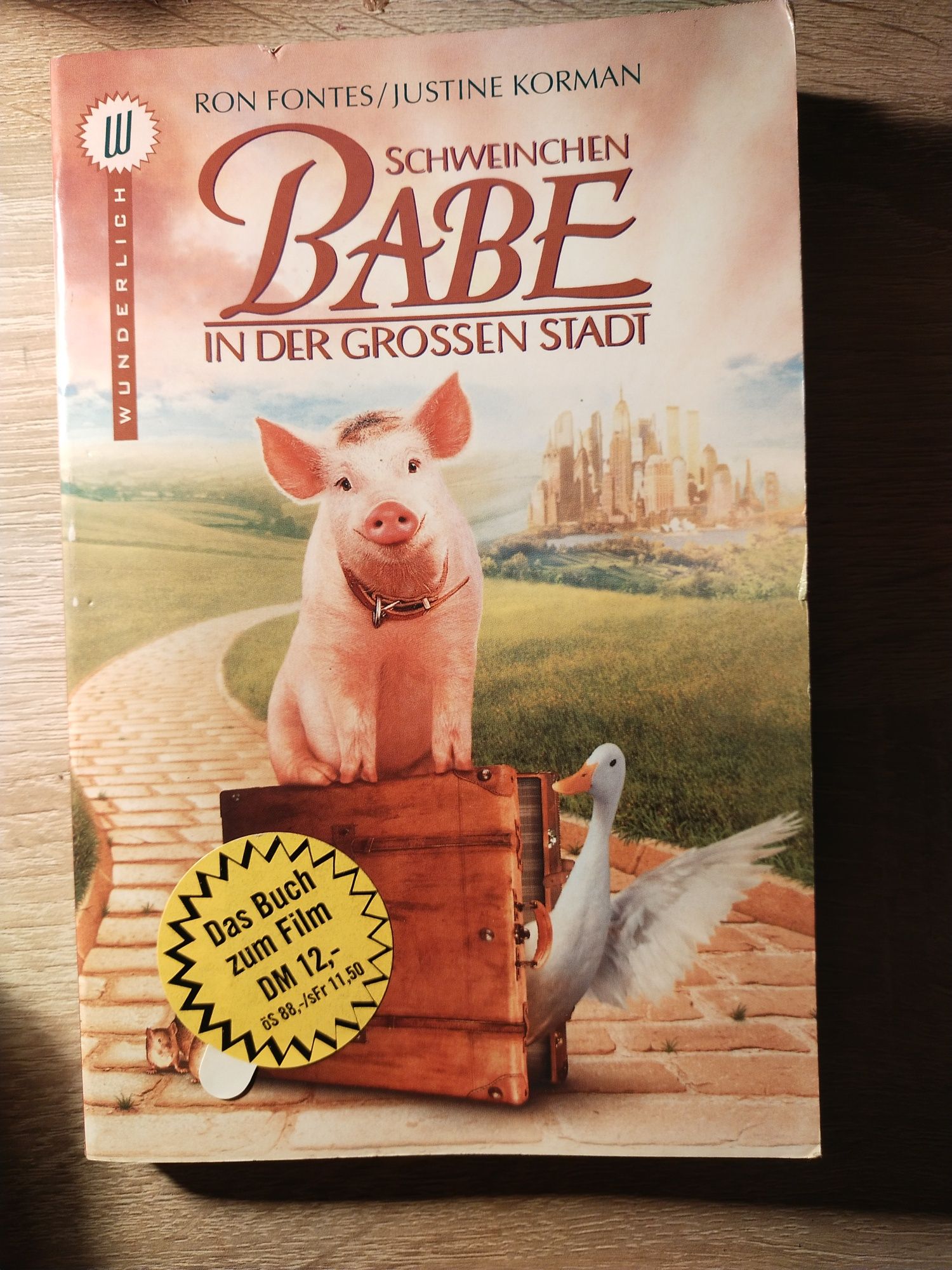 Książka "Schweinchen Babe in der grossen Stadt"