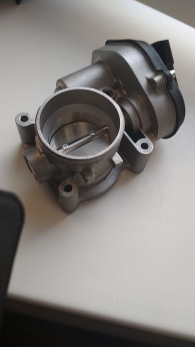 Дроссельная заслонка Форд