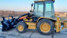 Koparko-ładowarka CAT 428D JCB CASE VOLVO
