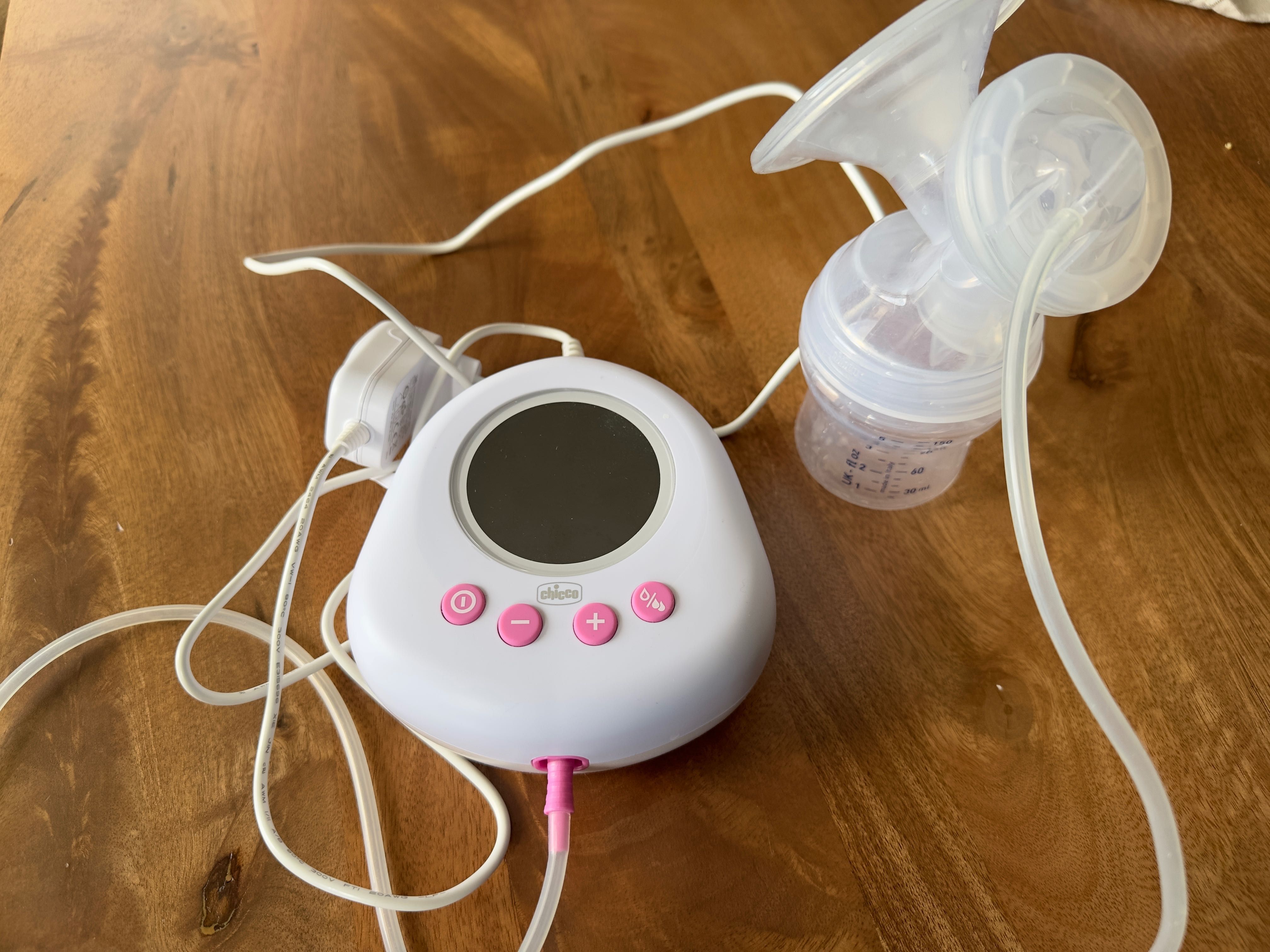 Bomba extratora de leite materno Chicco + copos de armazenamento