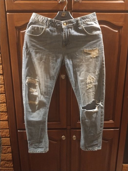 Jeansy z rozdarciami rozm.L