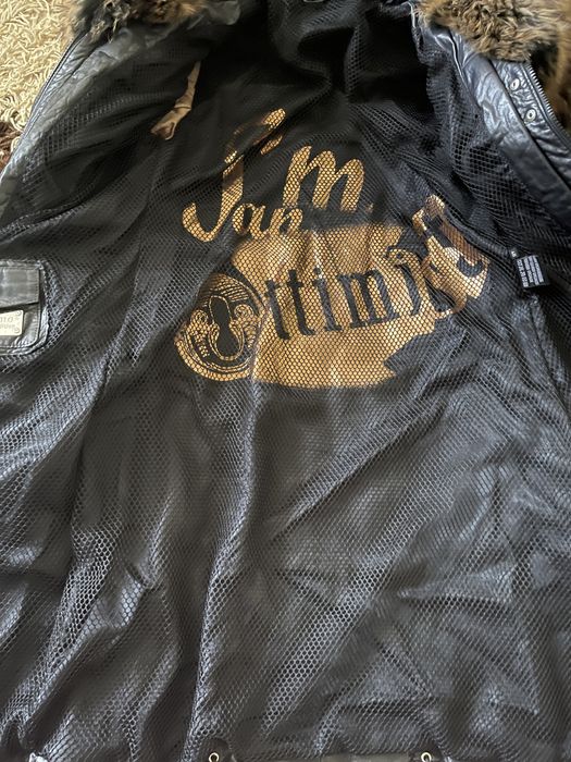 Зимний кожаный пуховик